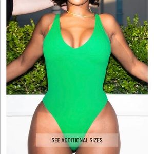 Ta3 - Hi-cut plungey swimsuit